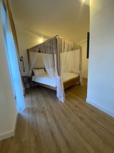 Postel nebo postele na pokoji v ubytování Domino Hotel