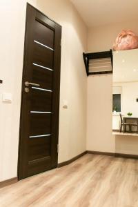 Фотография из галереи Brassy apartment в Риге