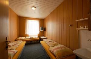 Postel nebo postele na pokoji v ubytování Hotel u Nádraží Lanžhot