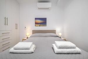 Posteľ alebo postele v izbe v ubytovaní Anius Apartments