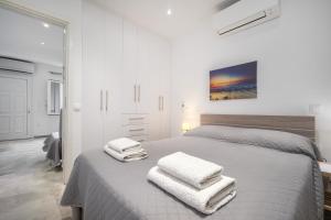 Posteľ alebo postele v izbe v ubytovaní Anius Apartments