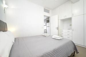 Posteľ alebo postele v izbe v ubytovaní Anius Apartments