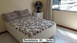 Giường trong phòng chung tại Apartamentos Universo