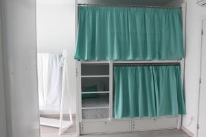 Letto o letti in una camera di ArouceHostel