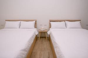 Letto o letti in una camera di 澎湖逸軒居民宿