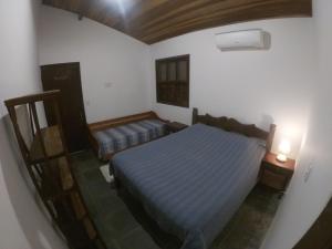 Postelja oz. postelje v sobi nastanitve Casa de praia em Paúba perto de cachoeira e 5min de Maresias