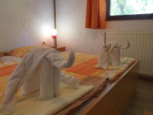 Postel nebo postele na pokoji v ubytování Apartments Smirnov