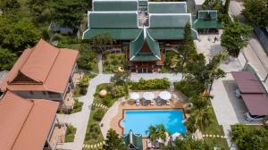 an overhead view of a building with a swimming pool at Wandee Garden in Choeng Mon Beach