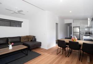 a living room with a couch and a table at Marysville Holiday Park in Marysville