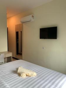 TV a/nebo společenská místnost v ubytování M Quality Hotel