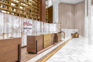 Certifikát, hodnocení, plakát nebo jiný dokument vystavený v ubytování Makarem Ajyad Makkah Hotel