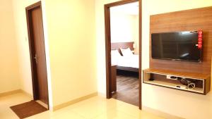 TV a/nebo společenská místnost v ubytování Hotel Rhythm Grand Suite