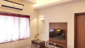 TV a/nebo společenská místnost v ubytování Hotel Rhythm Grand Suite