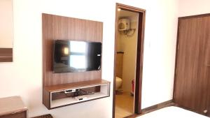 TV a/nebo společenská místnost v ubytování Hotel Rhythm Grand Suite