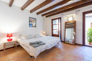 A bed or beds in a room at POC A POC SUITES