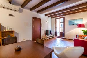 A television and/or entertainment centre at POC A POC SUITES
