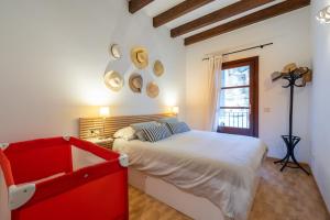 A bed or beds in a room at POC A POC SUITES