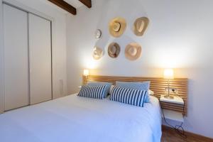 A bed or beds in a room at POC A POC SUITES