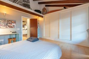 A bed or beds in a room at POC A POC SUITES