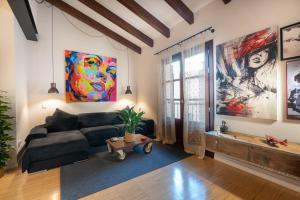 A seating area at POC A POC SUITES