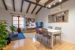 A television and/or entertainment centre at POC A POC SUITES