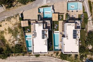 an aerial view of a house with a pool at Iron Villas - Nefeli & Oniros in Pangalochori