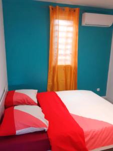 Ліжко або ліжка в номері Maison de 2 chambres avec jardin clos et wifi a Morne a l'Eau