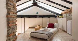 Posteľ alebo postele v izbe v ubytovaní JOIVY Cosy Apt in Como Centre
