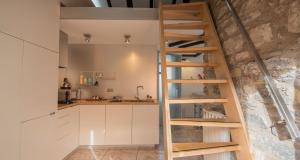 Kuchyňa alebo kuchynka v ubytovaní JOIVY Cosy Apt in Como Centre