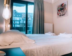Katil atau katil-katil dalam bilik di Appartementen by WP Hotels