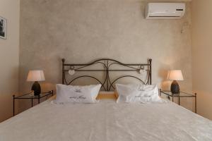 Un pat sau paturi într-o cameră la Villa Nona Marija
