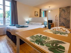 Ένα ή περισσότερα κρεβάτια σε δωμάτιο στο La Tour Pom'Pin +66 φωτογραφίες