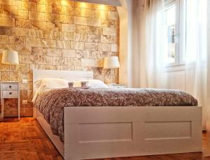 Postel nebo postele na pokoji v ubytování Appartamento San Frediano