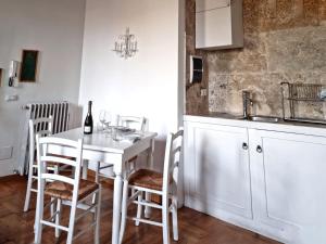 Kuchyň nebo kuchyňský kout v ubytování Appartamento San Frediano