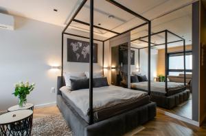 Postel nebo postele na pokoji v ubytování LupoApartments Łęczycka 29 Klimatyzacja Parking Dostęp na Kod