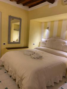 Ένα ή περισσότερα κρεβάτια σε δωμάτιο στο Gaia's Apartment