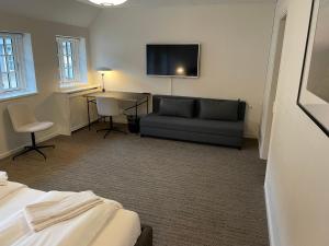 Μια τηλεόραση ή/και κέντρο ψυχαγωγίας στο Hotel Nørrevang
