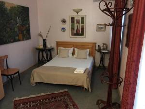 Katil atau katil-katil dalam bilik di Altstadt Hotel & Cafe