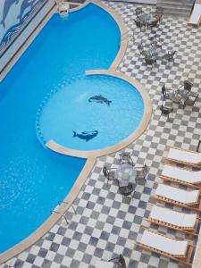 The swimming pool at or close to Studio pool view next to the Marina,Sheraton Plaza 320