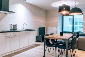 Kuchyň nebo kuchyňský kout v ubytování Appartementen by WP Hotels
