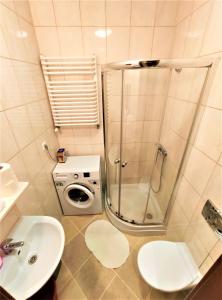 Kúpeľňa v ubytovaní Abak Krakow Apartment