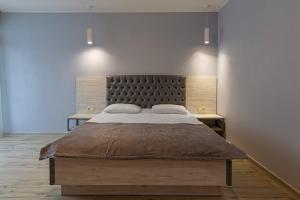 Postel nebo postele na pokoji v ubytování Milana SPA & Hotel - SPA included