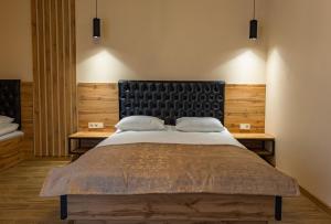 Postel nebo postele na pokoji v ubytování Milana SPA & Hotel - SPA included