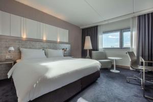 Postel nebo postele na pokoji v ubytování Radisson Blu Airport Hotel, Oslo Gardermoen