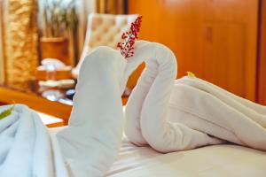 Voodi või voodid majutusasutuse Hotel Perce Neige toas
