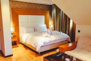 Voodi või voodid majutusasutuse Hotel Perce Neige toas