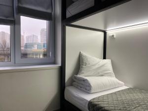 Postel nebo postele na pokoji v ubytování Kyivpasservis HOSTEL