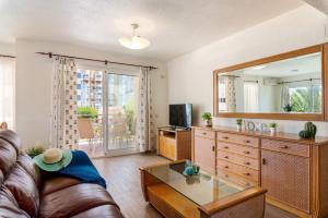 Televízia a/alebo spoločenská miestnosť v ubytovaní Apartamento Arenal 2 - PlusHolidays