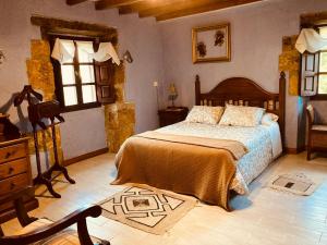 Posteľ alebo postele v izbe v ubytovaní Casa Rural Molino de Luna