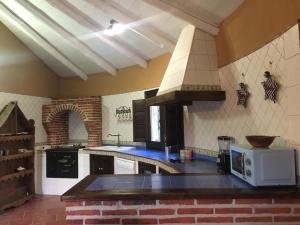 Virtuvė arba virtuvėlė apgyvendinimo įstaigoje El Chozo